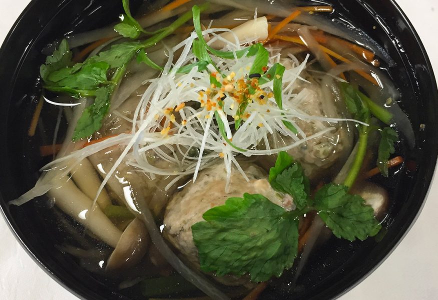 Egg noodle soup with Pacific saurian pike meatballs and vegetables