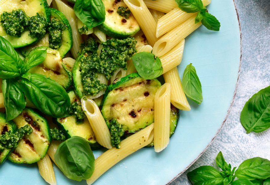 Wholewheat penne with courgettes, fresh basil, spring onions and Feta cheese