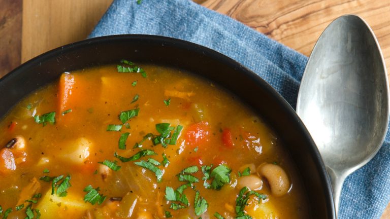 Bean, carrot and turmeric soup